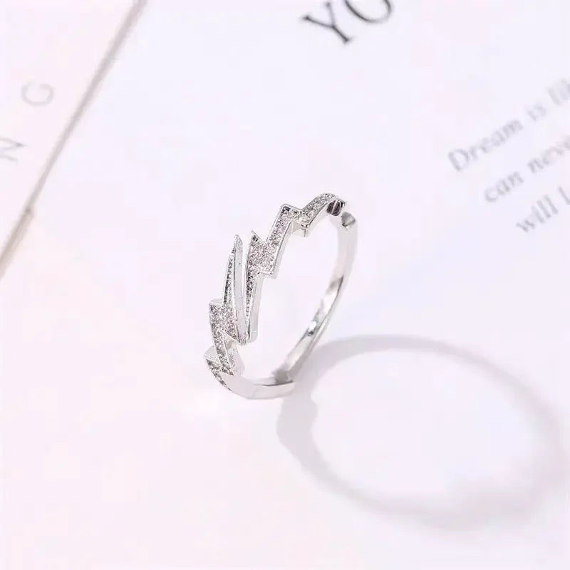 anillo  Silver Color Lightning y flor de camelia Adjustable